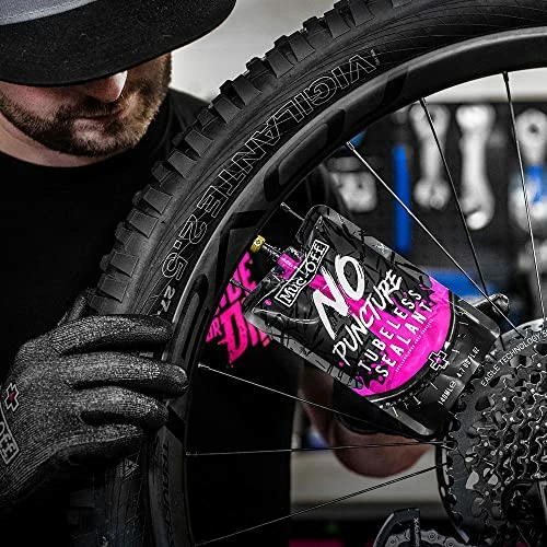 Best reviews of π Muc Off No Puncture Hassle Tubeless Sealant - Advanced Bicycle Tyre Sealant With UV Tracer Dye That Seals Tears And Holes Up To 6mm π - Image 4